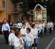 I miniportantini indossano una veste identica a quella dei portantini 'grandi'
