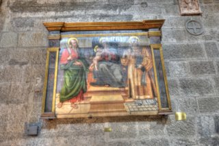 Vergine che allatta Ges� tra i Santi Bartolomeo e Lorenzo. Navata destra. (sec. XV-XVI). Tavola a tempera di scuola di Monaldo Trofi.
